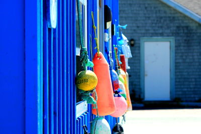 Buoys hanging on blue wall