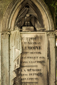 Text on stone at cemetery