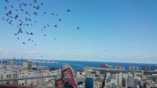 Cityscape against blue sky