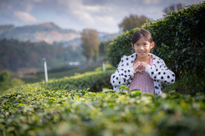 Portrait of a girl in field