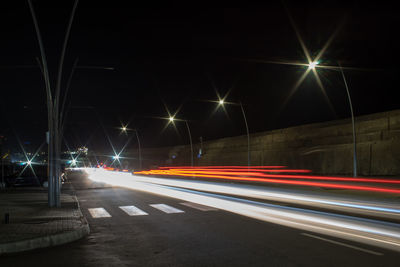 Light trails on road at night