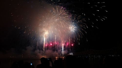 Firework display at night