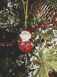 Close-up of christmas decoration hanging on tree