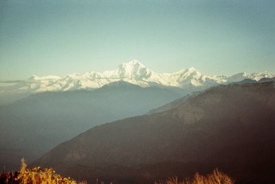 Scenic view of snowcapped mountains against sky