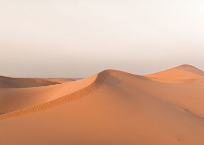 Scenic view of desert against sky