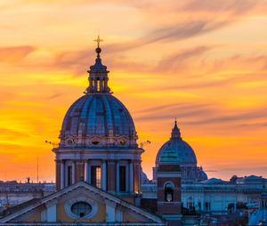 Low angle view of building against sky during sunset