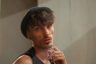 Portrait of young man looking away