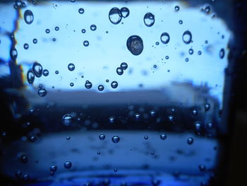 Close-up of water drops on glass