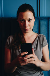 Young woman using smart phone