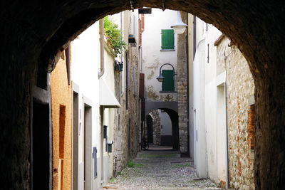 Narrow alley amidst old buildings