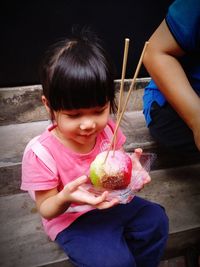 Cute girl holding ice cream