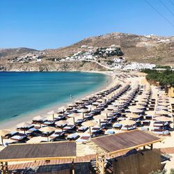 High angle view of swimming pool by sea against clear sky