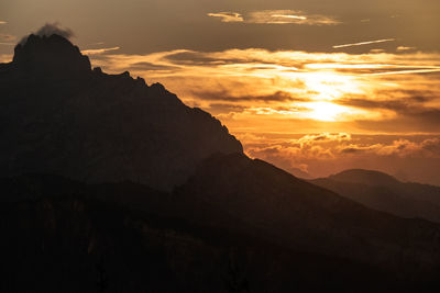 Scenic view of mountains against sky during sunset