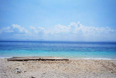 Scenic view of sea against blue sky