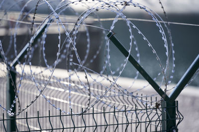 Close-up of barbed wire fence