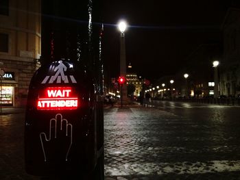 Illuminated street light at night