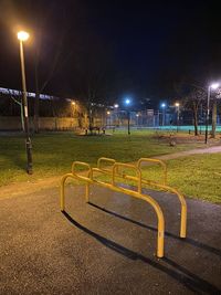 Empty road in park at night