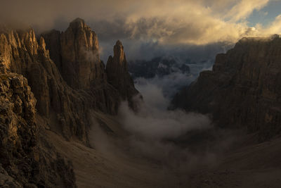 Panoramic view of mountains against sky during sunset