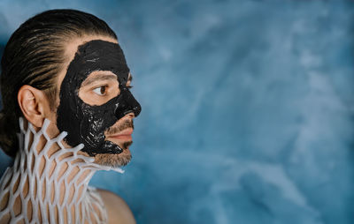 Close-up of woman wearing mask