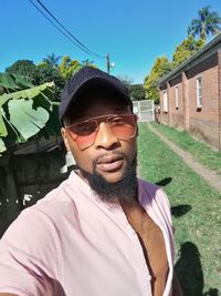 Portrait of young man wearing sunglasses