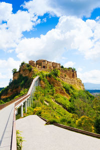 Bridge over road against sky