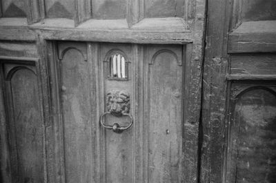 Close-up of closed door of old building