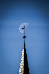 Low angle view of built structure against blue sky