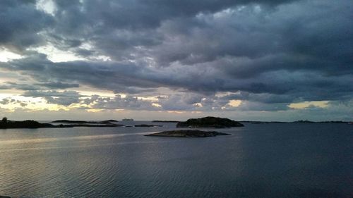 Scenic view of sea against cloudy sky