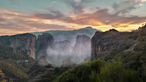 Scenic view of mountains against sky during sunset