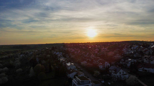 High angle view of townscape against sky during sunset