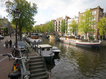 Boats moored in canal