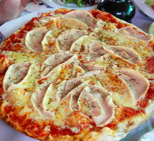 Close-up of pizza served in plate