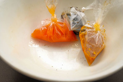 High angle view of orange slice in plate