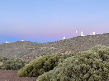 Scenic view of land against clear sky