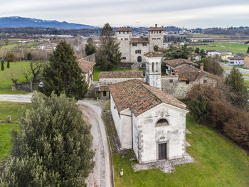 High angle view of old building in city against sky