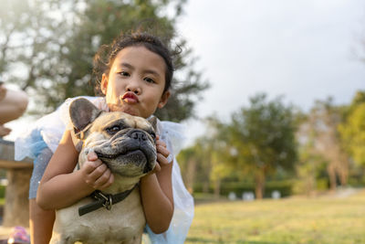 Portrait of boy with dog