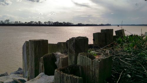 Scenic view of sea against cloudy sky