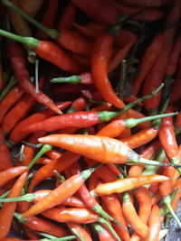 Full frame shot of red chili peppers for sale at market