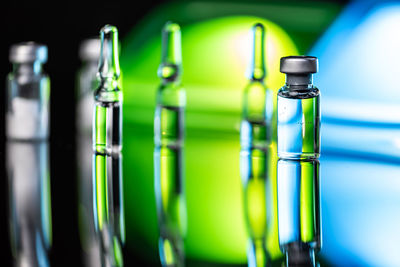 Close-up of empty glass bottles