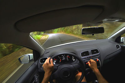First person view of a guy driving a car
