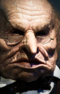 Close-up portrait of man wearing eyeglasses