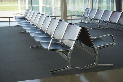 Empty chairs at airport