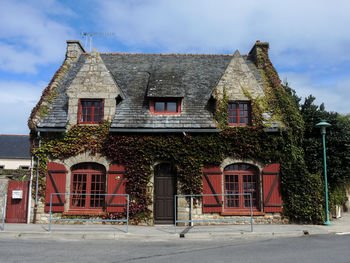 Facade of building against sky