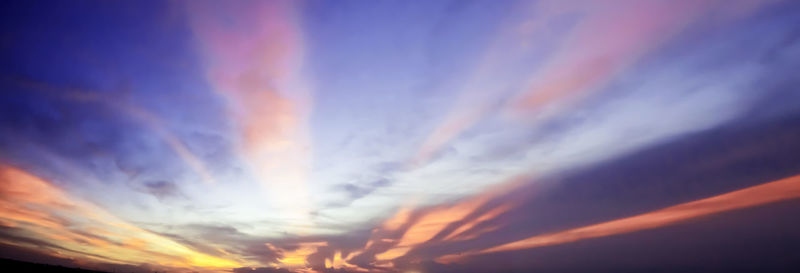 Low angle view of dramatic sky during sunset