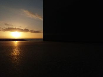 Scenic view of sea against sky at sunset