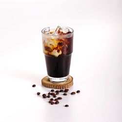 Close-up of coffee cup against white background