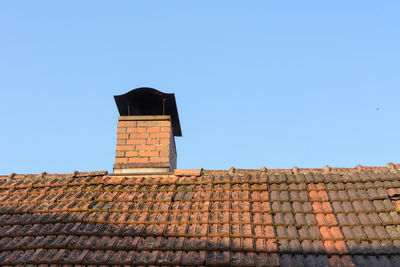 Low angle view of house against clear sky