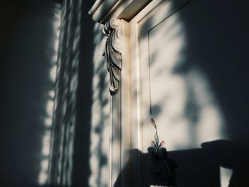 Low angle view of carving on wall at home