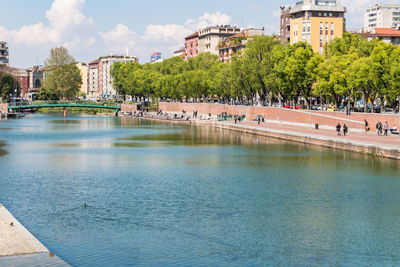 View of bridge over river in city