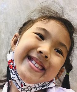 Close-up portrait of smiling boy